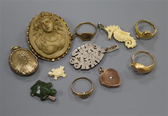 An 18ct dolphin ring, a similar yellow metal ring, two 9ct signet rings, a lava cameo and sundries.